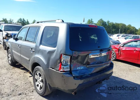 2010 Honda Pilot Touring z USA, uszkodzony, nr VIN 5FNYF4H89AB012332